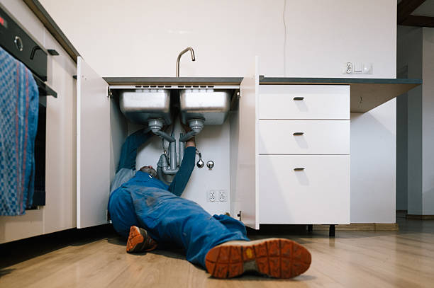 Professional Drain Cleaning technician working in Mountain Home, TX